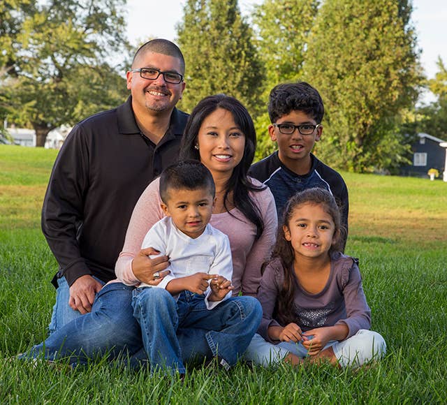 Nevada Family posing for a picture outside