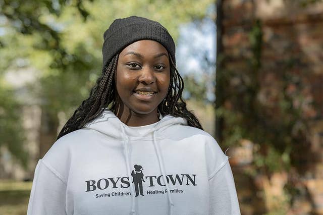 Boy Town Girl wearing hoodie