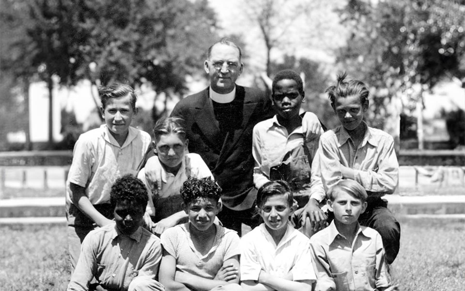 Father Flanagan with a group of boys