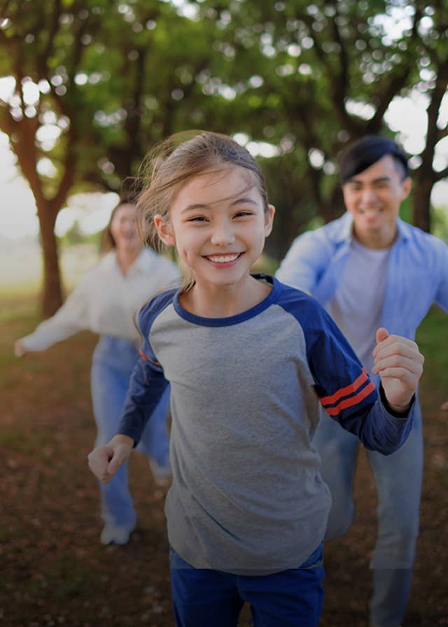 Young kids running outdoors