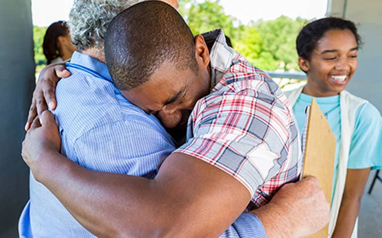 Loving family hugging each other