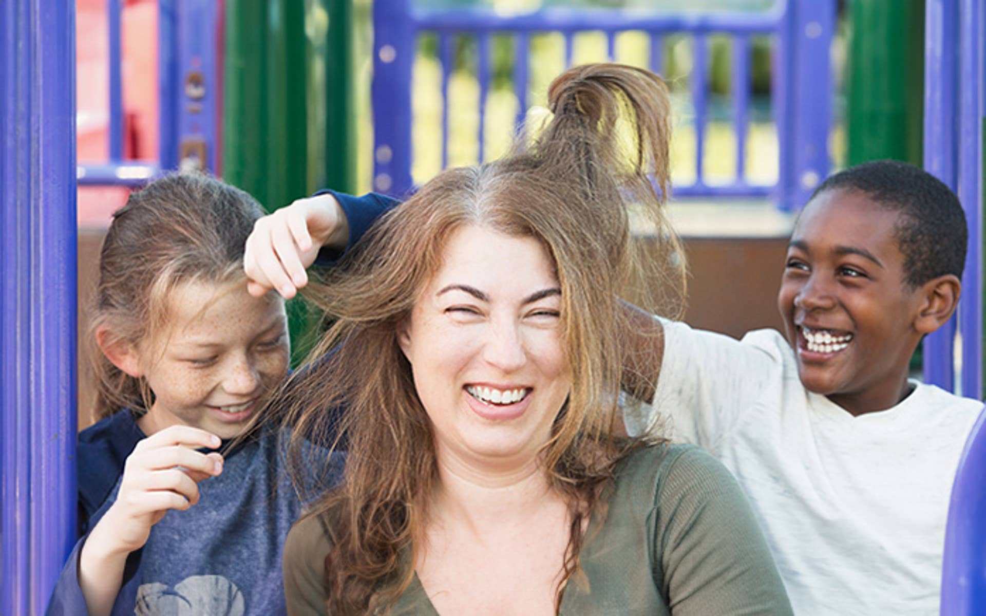 Kids playing with moms hair